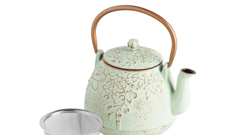 Light green embossed cast iron teapot from World Market