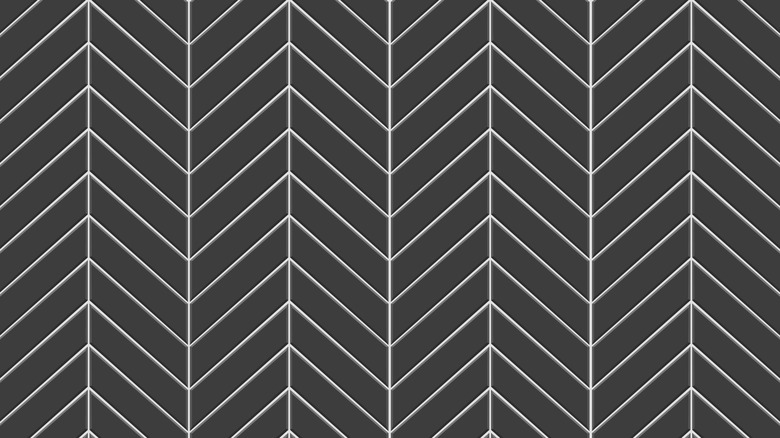 Dark gray tiles in a chevron pattern
