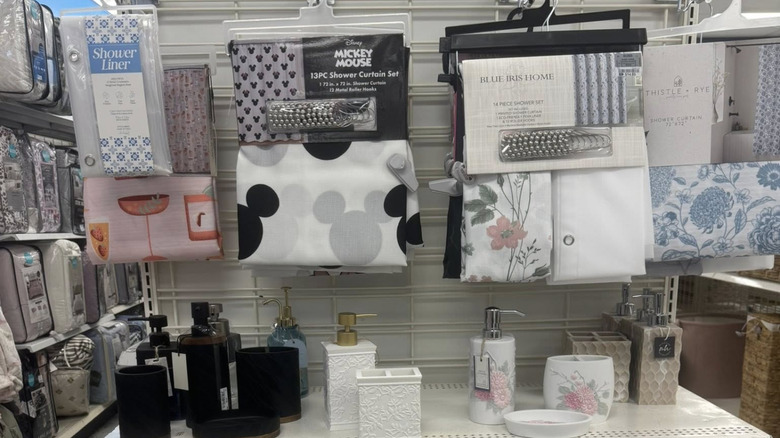 Bathroom accessory end cap with shower curtains, shower liner, and soap holders