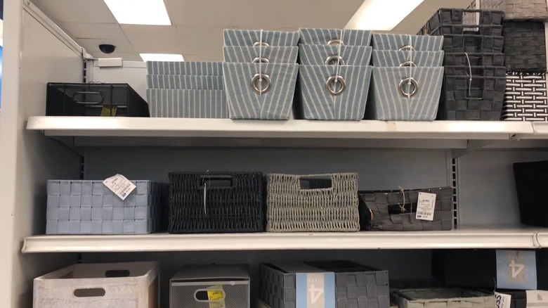 Woven and fabric storage bins on shelves of Ross Dress for Less