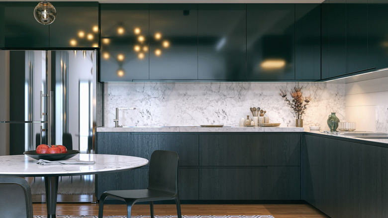 Brick backsplash over dark wood-grain lower cabinets.
