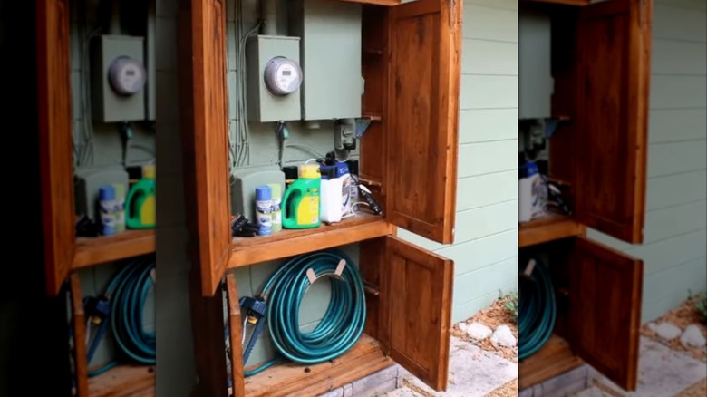 a cabinet can be repurposed to hide electrical eyesores on the sides of buildings
