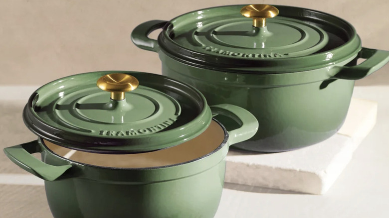 Two green Costco Dutch ovens