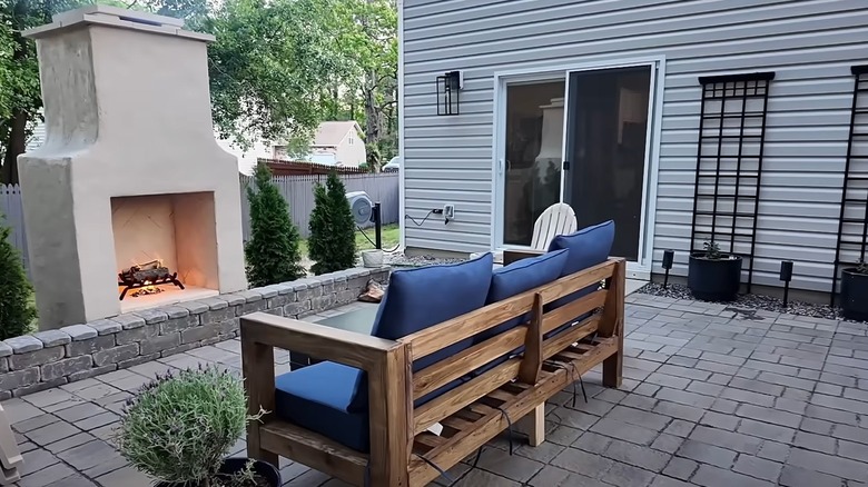 Backyard with DIY fireplace and patio furniture