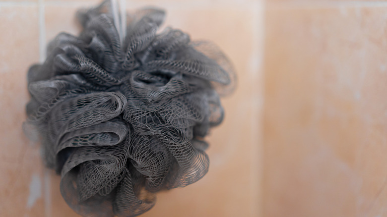 Close up of grey shower pouf