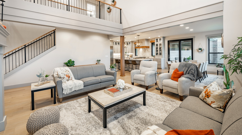 A living room with a high ceiling