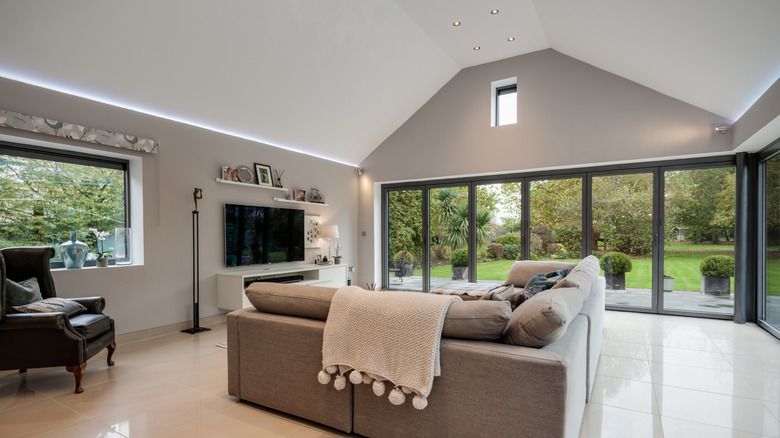 Sleek modern living room with LED light strips in coves