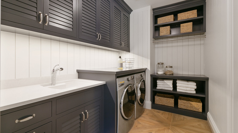 Gray and white custom laundry room