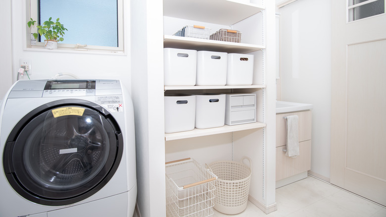 white  baskets in laundry room