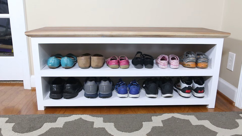 a diy shoe storage bench for the entry way is practical in many ways