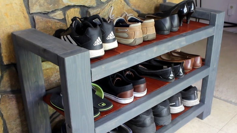 a sturdy shoe rack or shelf made with scrap wood