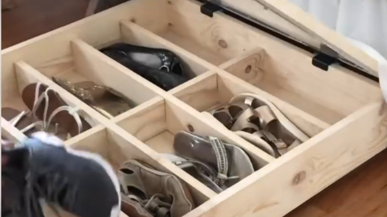 an under-the-bed rolling she storage unit that you can make from scrap wood