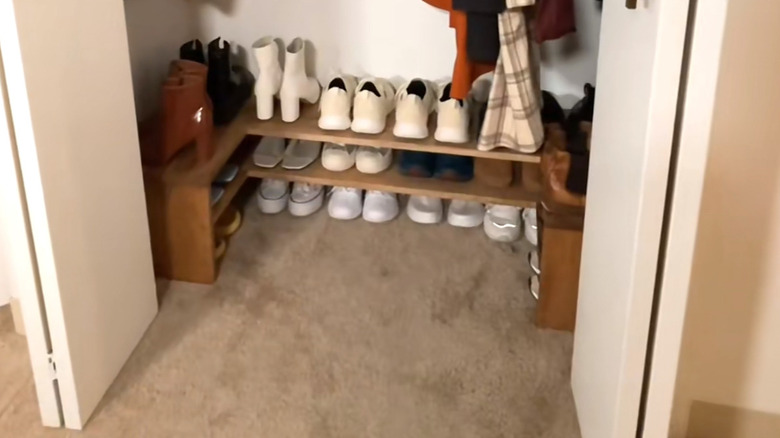 wraparound shoe storage in a small bedroom closet
