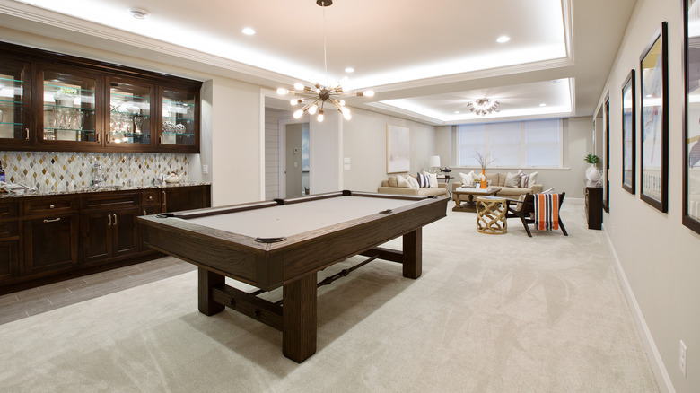 large basement with pool table