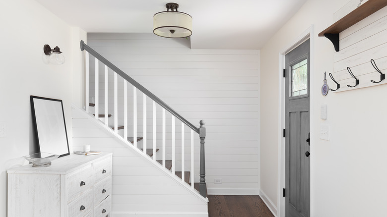 Shiplap staircase and wall