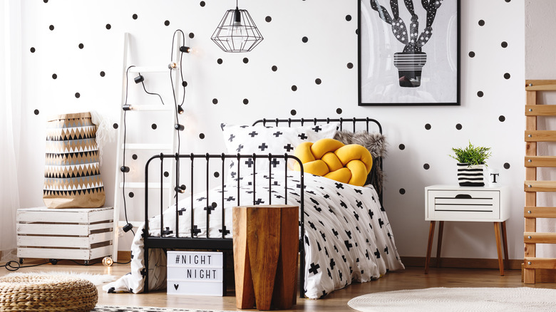 room with polka dot wallpaper