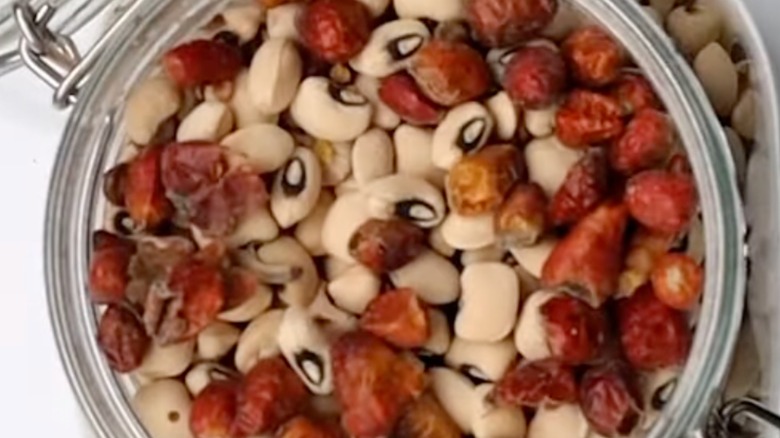 Dried peppers in a bean container.