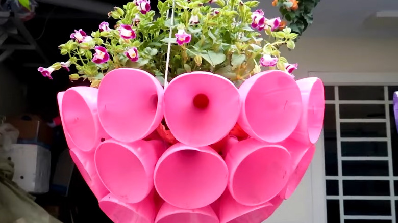 a planter made from recycled plastic bottles