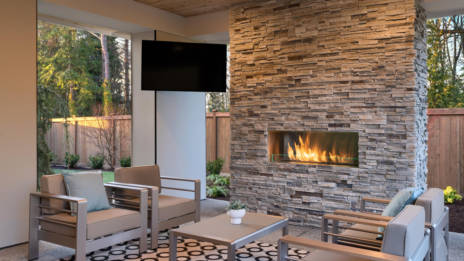 25 Stone Fireplaces That You'll Want To Hunker Down In Front Of
