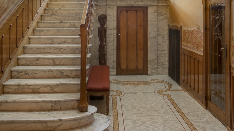 A hallway with patterned tile