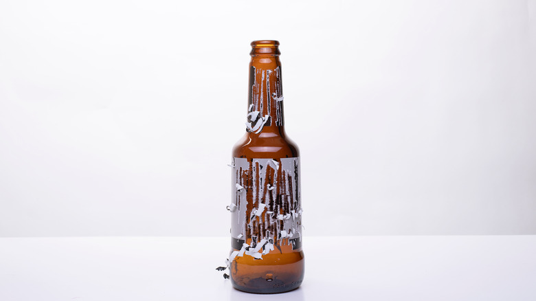 bottle with scraped label