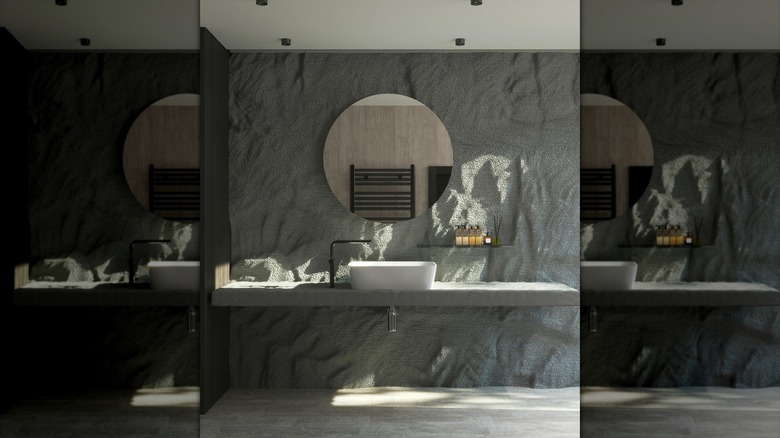 dark gray textured accent wall in bathroom behind vanity