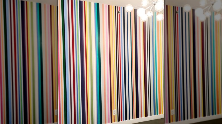 rainbow stripe accent wall with lighting
