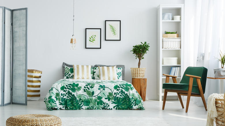 tall white bookcase in corner