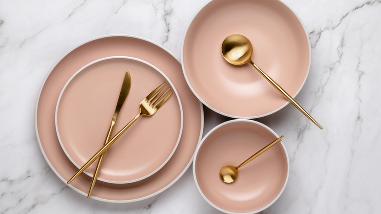 pink plates and bowls