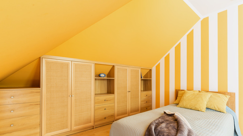 Attic bedroom with stripes