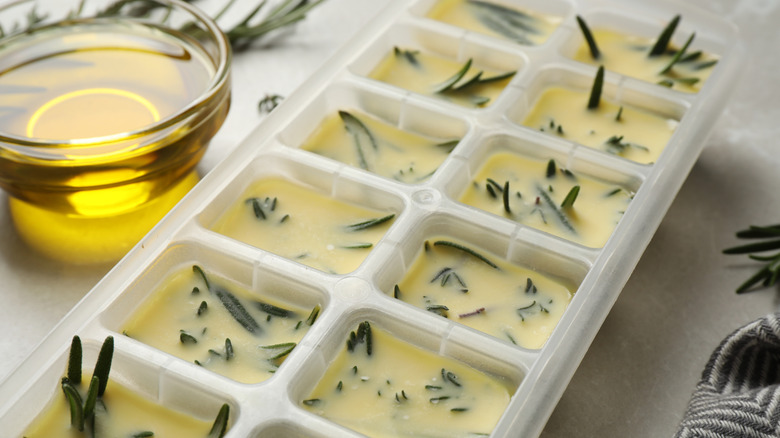 Herbs preserved in oil in ice cube tray