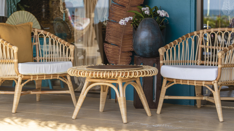 A collection of wicker furniture on the patio