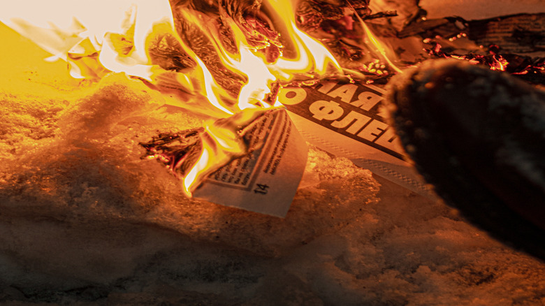 A closeup of paper burning in a fire
