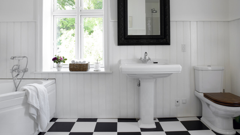 black and white checkerboard floors in bathroom