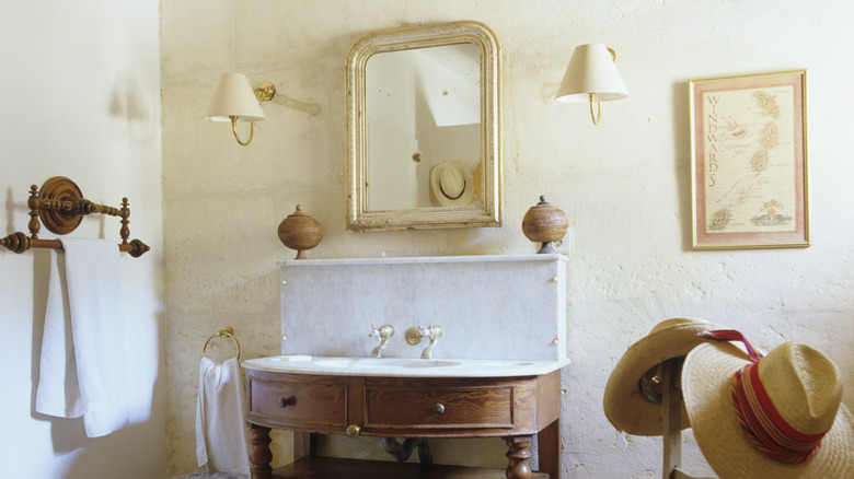 bathroom with framed art