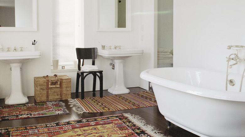 vintage bathroom with persian rugs