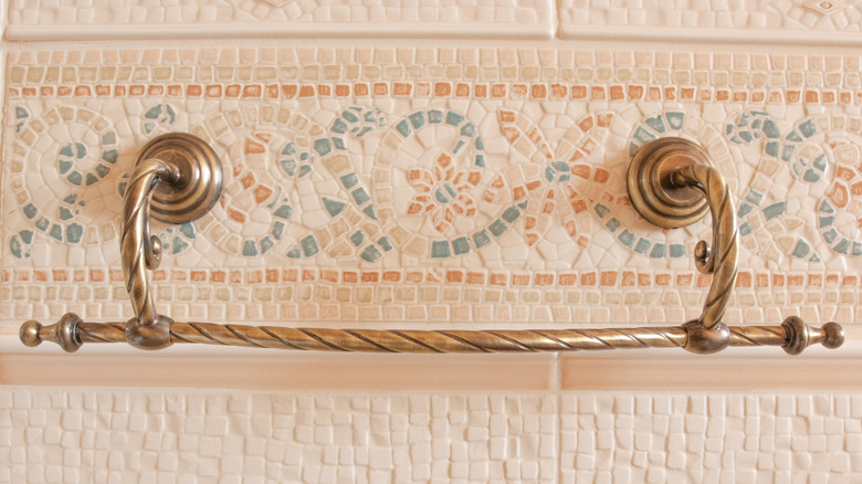 ornate brass rowel rack