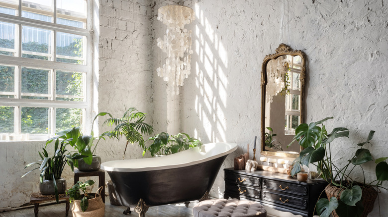 vintage shell chandelier over tub
