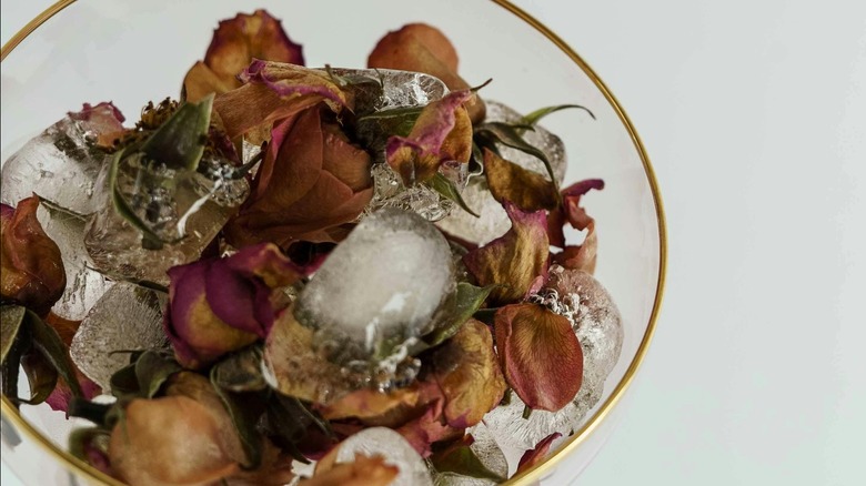 gold-rimmed glass bowl with potpourri