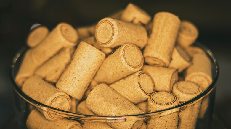 glass bowl filled to the brim with wine bottle corks
