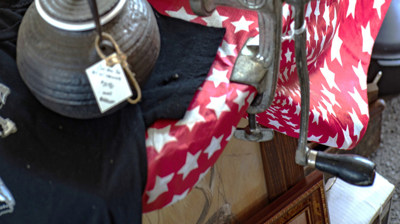 Table covered with cast iron kitchen tools