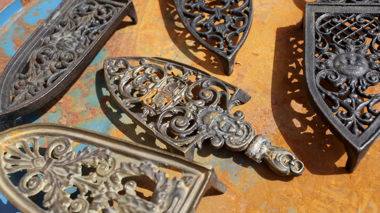 Decorative cast iron trivets