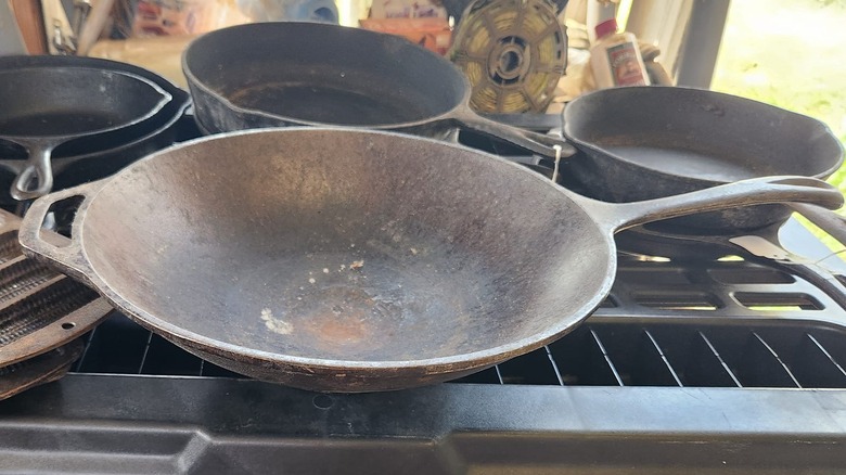 Cast iron wok with other cookware