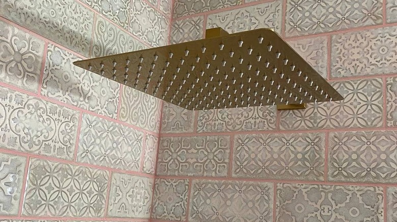 Bathroom with gray tile and salmong grout