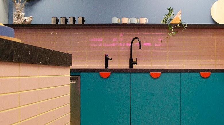 Kitchen with pink tile and yellow grout