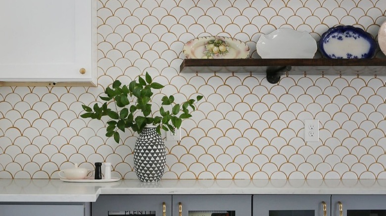Kitchen with white tile and gold grout
