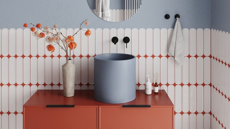 White tile with terracotta grout and terracotta accents
