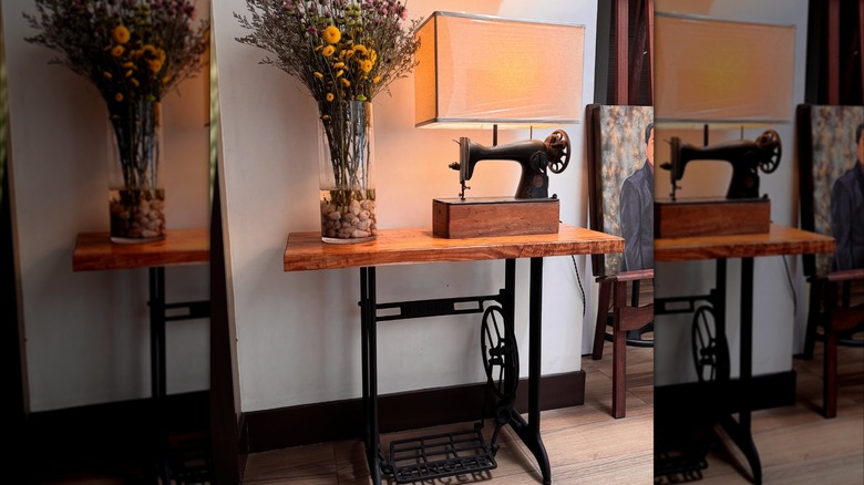 A sewing machine turned into a console table