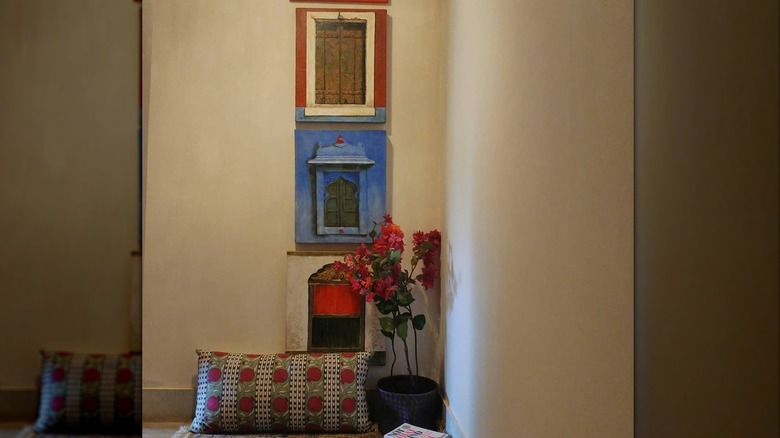 Artwork on wall near staircase landing