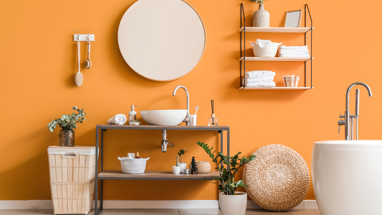floating shelves near vanity mirror